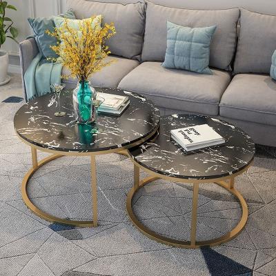 China Nordic modern light luxury new round small modern simple living room household coffee table for sale