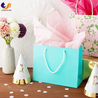 China Reusable handmade custom manufacture luxury retail logo printed cardboard paper bags logo white boutique paper shopping gift to carry bags for sale