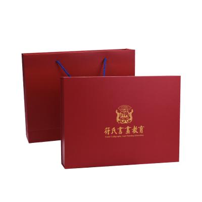 China Recyclable High Quality Red Magnetic Gift Wrapping Gift Boxes Custom Printed Paper Gift Boxes With Handle for sale