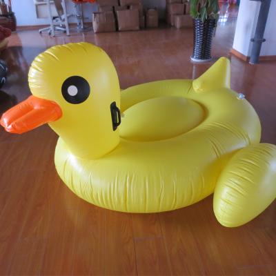 China Factory Women Inflatable Ride, Big Row Float Ride With Handle 2021 New Big Yellow Duck Floating Row, Swimming Ring for sale