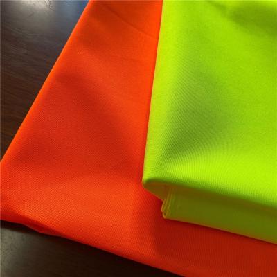 China Fluorescent Fluorescent Polyester Fabric Color Fluorescent Yellow Orange Blue Green For Sanitation Worker Traffic Uniform Vest for sale