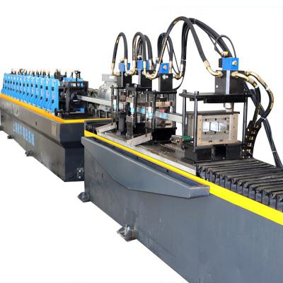 China WALL Building Material Rolling Shutter Metal Door Frame Roll Forming Machine for sale