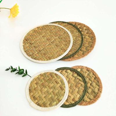 China Sustainable Natural Woven Water Mat Straw Rattan Placemat Heat Insulation Coasters Hyacinth Grass Round Tablemat Tea Cup for sale