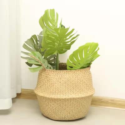 China Sustainable Bohemian Plant Plankton Belly Rattan Woven Basket With Handles For Storage Laundry Plant Baskets for sale