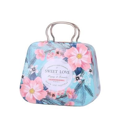 China Food cute handbag shape tin handbag candy gift packing tin boxes for children toy for sale