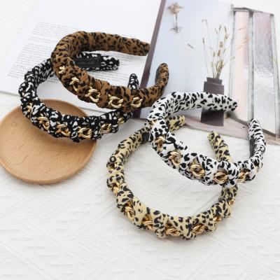 China Handmade Cross Chain Circle Design Metal Knot Headband Leopard Print Wide Headband Hair Accessories for sale