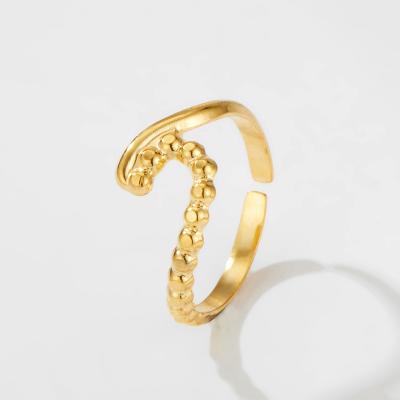 China Trendy Fashion Ring Gold Wave Stainless Steel Ring Men Women 18k Gold Metal Adjustable Titanium Rings for sale