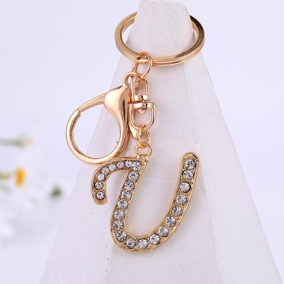 China Never Letter A-Z Rhinestones Crystal Letter Keychain Zinc Alloy Ring Pendant Women Bag Accessories Shiny Key for sale