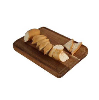 China Kitchenware Acacia Wood Cutting Plates For Kitchen Juice Flutes Cutting Board Large for sale