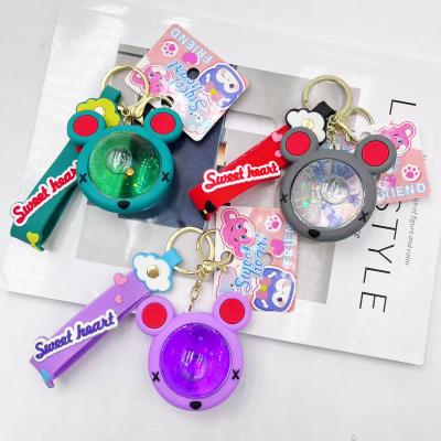 China Cartoon Fashion Acrylic in Oil Drift Bottle Mickey Keychain Quicksand Lovely Animal Keyring for Kids Party Favors Gifts for sale