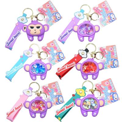 China Creative cute cartoon key chain accessories liquid in the oil key chain acrylic animal starry dew key chain for sale