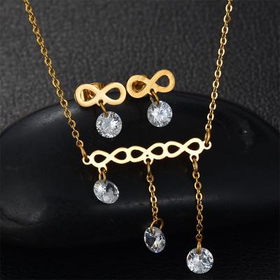 China 2021 CLASSIC Stainless Steel White Zircon Bowknot Set Necklace + Simple Stud Earrings Ladies Jewelry for sale