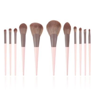 China Angular Blush Pink Wooden Handle Cosmetic Brush Face Eyebrow Lip Brush China Factory Supply OEM/ODM 11pcs Direct From China for sale