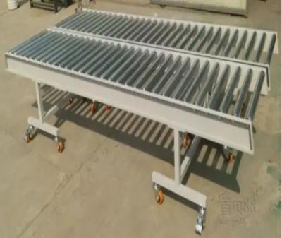 China 3C durable using low price unloading equipment container unloading automatic motor conveyor for sale