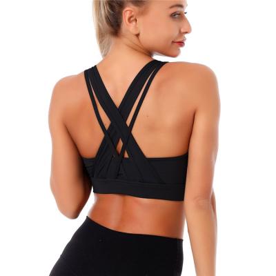 China 2021 New Arrival Women's Breathable Cross Back Wireless Medium Support Tops Sports Removable Bra Cups Yoga Sports Bra For Ladies for sale