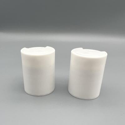 China 28/415 non refillable high quality white plastic press disc top cap cap for cosmetic and shampoo cream for sale