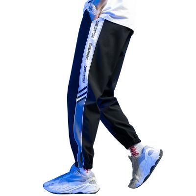 China Anti-wrinkle summer teenage boys Korean version of the foot pants brand trend relaxed soft casual sports pants for sale