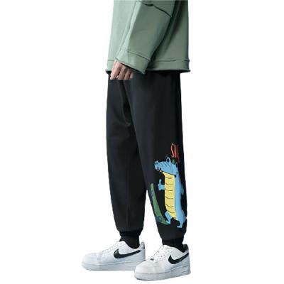 China Spring And Autumn Korean Fashion Brand Boys Anti-wrinkle Men's Loose Foot Sports Printed Casual Pants Large Size for sale