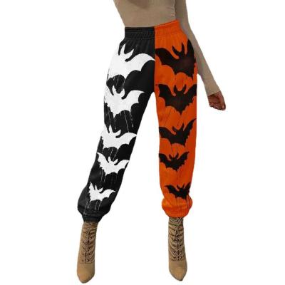 China Anti-wrinkle 2021 New Autumn/Winter Street Hipster Harlan Sportswear Black Loose Orange Print Dress Casual Women's Pants for sale