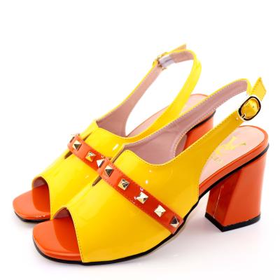 China Factory Price of Anti-odor Stones Italian High Heels Shoes And Sandals Yellow African For Lady for sale