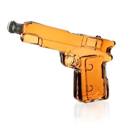 China Beverage 150ml/200ml Novelty Handcrafted Gun Bottle Gun Whiskey Gun Glass Bottle for sale