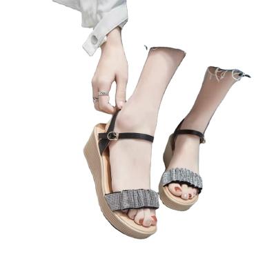 China Around 2022 new summer style fashion women's low heel leather shoes lady beach slipper lady slippers wedge slippers for sale