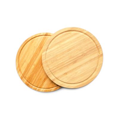 China Sustainable Wholesale Round Cheese Board Small Bamboo Cutting Board With Groove Bamboo Chopper for sale