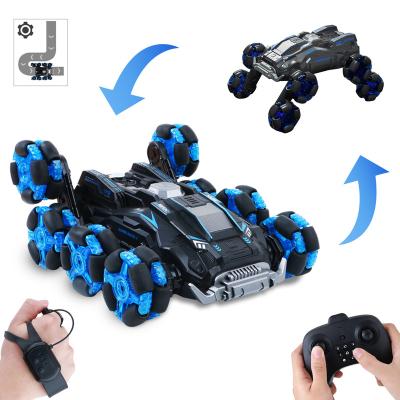 China Spray New Style 2.4G 8 Wheels Kid RC Toys Dual Side RC Stunt Jet Car Watch Radio Control Drift Car for sale