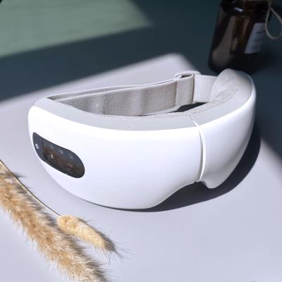 China Electric Cordless EYE Eye Massager With Air Pressure Smart Eye Massager Intelligent Heating Eye Massager for sale