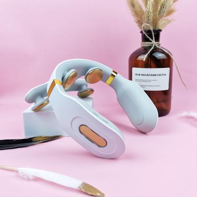 China Best Selling EMS Electronic Neck Therapy Pulse Massager Portable Wireless Electric Heating Neck Massager for sale