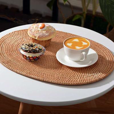 China Sustainable Handmade Rattan Place Mat Natural OVAL Shape Woven Place Mat for sale