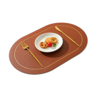 China Nordic Kitchen Stocked Dining Faux Leather Table Mat OVAL Custom Printed PU Leather Place Mat for sale