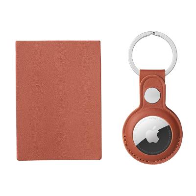 China Anti-drop Customized Short Anti-lost Location Tracker Genuine Leather Protective Airtags Case With Metal Key Chain Protective Case for sale