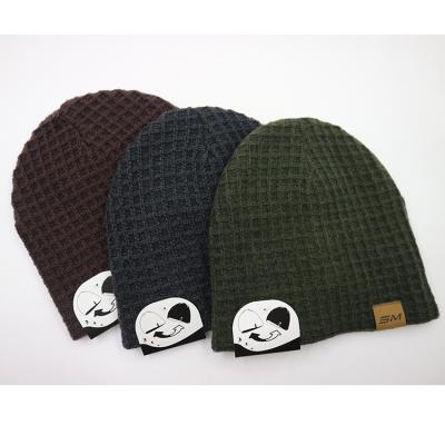 China Private Label COMMON Reversible Two Sided Acrylic Yarn Blended Waffle Jacquard Knit Winter Beanie Hat Skull Toque With Custom Hangtag for sale