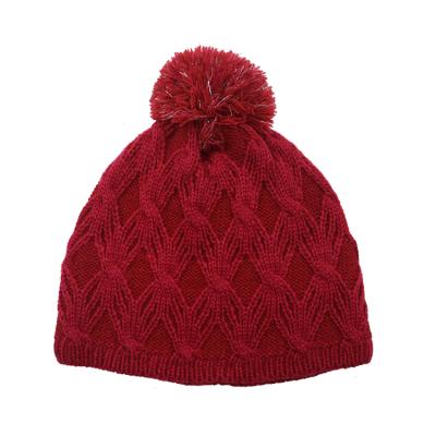 China JOINT Cable Acrylic Jacquard Knitted Winter Women Pom Pom Beanie Hat With Fleece Band Lining for sale