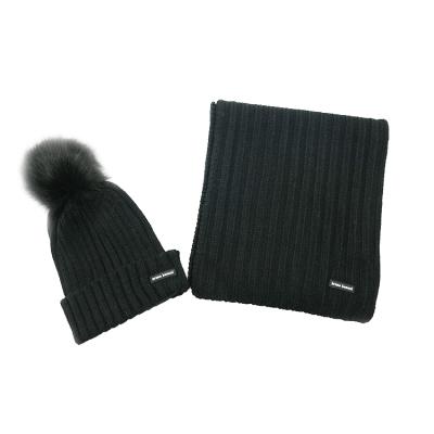 China COMMON Knits Manufacturer Custom Brand Acrylic Rib Knit Pom Pom Winter Beanie Hat and Scarf 2 Piece Set Women for sale