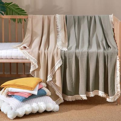 China Anti-Static Muslin Wraps Newborn Fringe Cotton Wraps Swaddle Sleep Comforter Tassel Baby Blanket for sale