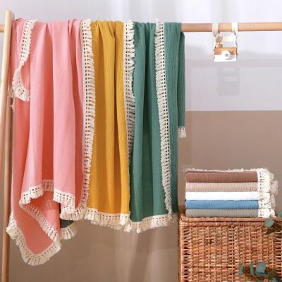 China Anti-Static European Warm Cotton Muslin Baby Blanket Ins Style Baby Bath Towel Soft Fringe Tassel Baby Wrap Covering for sale