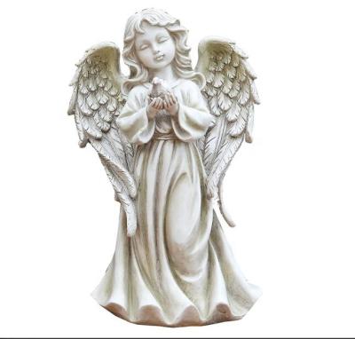 China Europe Wholesale 12.25 Inches Cute Little Girl Angel Holding Dove In Hand Sculpture Can Be Used As Garden Decoration for sale