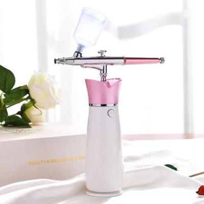 China Airbrush Beauty Mini Facial Airbrush Makeup Oxygen Cordless Airbrush Compressor Kit for sale