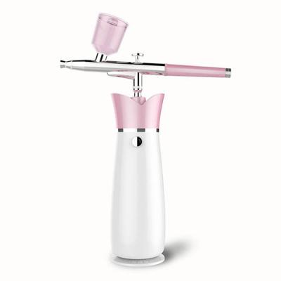 China Cake Decorating 2019 New Portable Mini Compressor Gravity Fed Airbrush Machine For Nails for sale