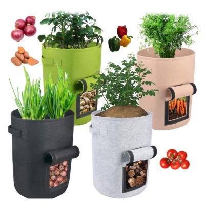 China Nonwoven Biodegredable Breathable Popular Vegetable Seedling Pot Garden Potato Felt Planting Grow Bags Growing Cloth Sack With Handle for sale