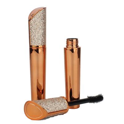 China HUAYI Cosmetic Customized Round Rose Gold Cosmetic Container Empty Eyeliner Mascara Packaging Tube With Brush for sale