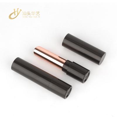 China HUAYI Hot Sales Cosmetic Luxury Cosmetic Containers Empty Magnet Black / Gold Lipstick Tubes Container Packaging for sale