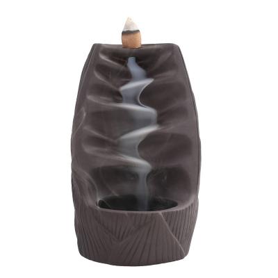 China Handcrafted Ready to Ship Small Backflow Ceramic Waterfall Monk Incense Burner Holder Incense Stick Holder for sale