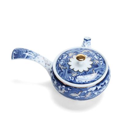 China Sustainable Ready To Ship Japanese Ceramic Porcelain Side Teapot With Handle for sale