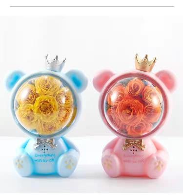 China Cartoon Eat Music Creative Night Light Space Bear Gift Money Piggy Bank Christmas Piggy Bank for sale