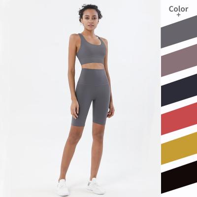 China WX22+WK926 Breathable Women High Quality Custom Made Logo Fitness Sports Bra Sets And Cycling Shorts Set for sale