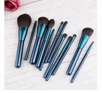 China Beauty Care Cosmetics Factory New Trend Luxury Shiny Diamonds High Quality Royal Blue 12pcs Makeup Brush Set With Chinese Style Cosmetic Bag for sale