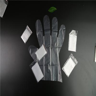 China Disposable PE Cleaning Gloves Folded By Pair In Pocket Food Grade Glove for sale